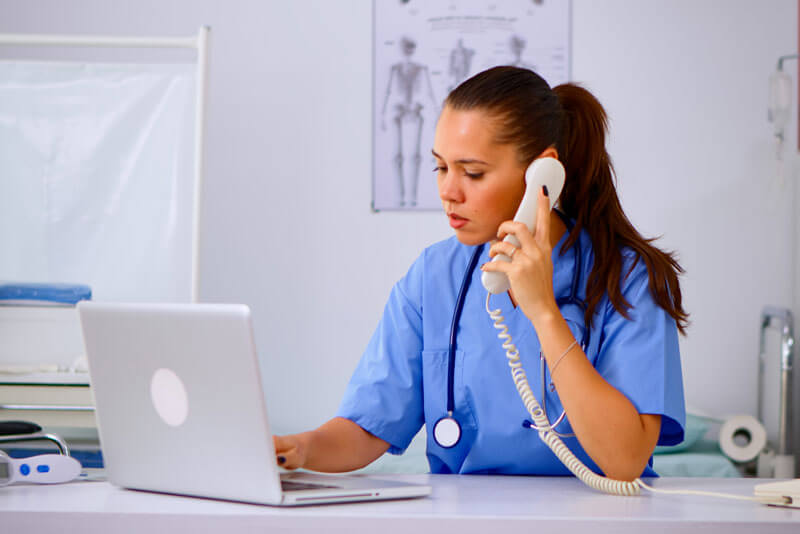 nurse reviewing the schedule online at schedule360 dot com